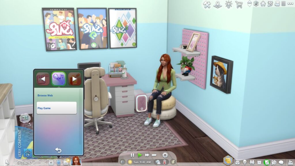A screenshot from the sims 4 showing the option to play games on a computer 