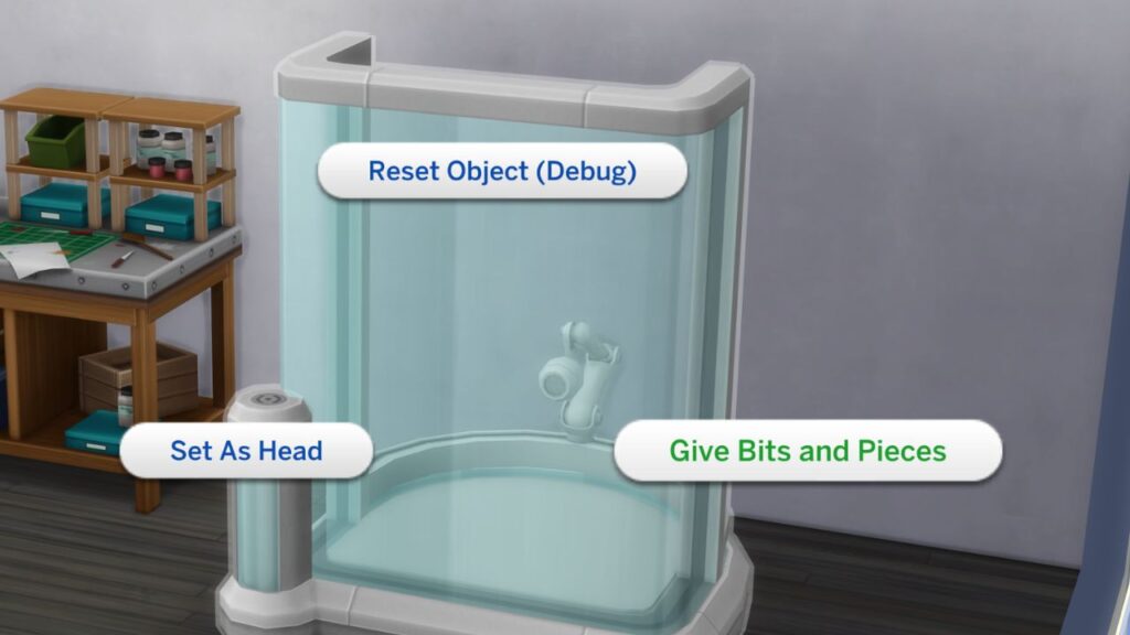 A screenshot from The Sims 4 showing how to cheat to get bits and pieces