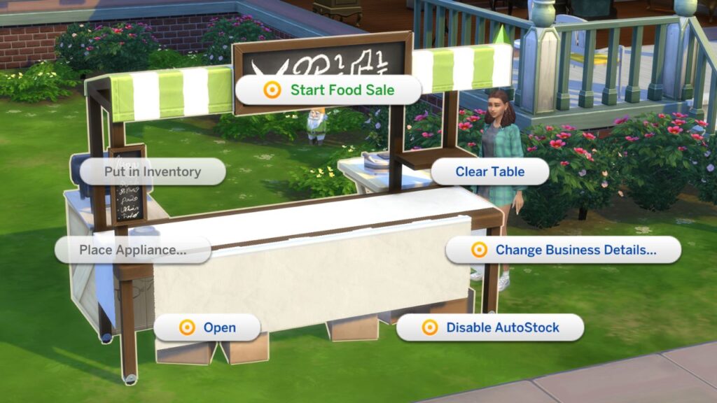 A screenshot from The Sims 4 showing a food stand with Start Food Sale highlighted