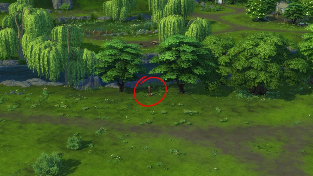 A screenshot from The Sims 4 showing the location of a wild bird house between 2 and 3 Olde Mill Lane