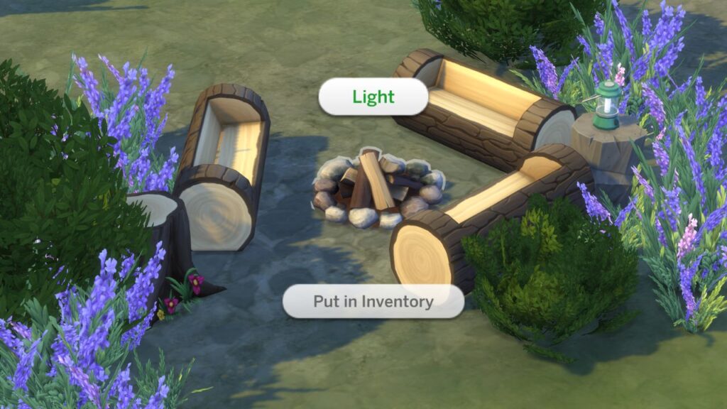 A screenshot from The Sims 4 showing how to light a campfire 