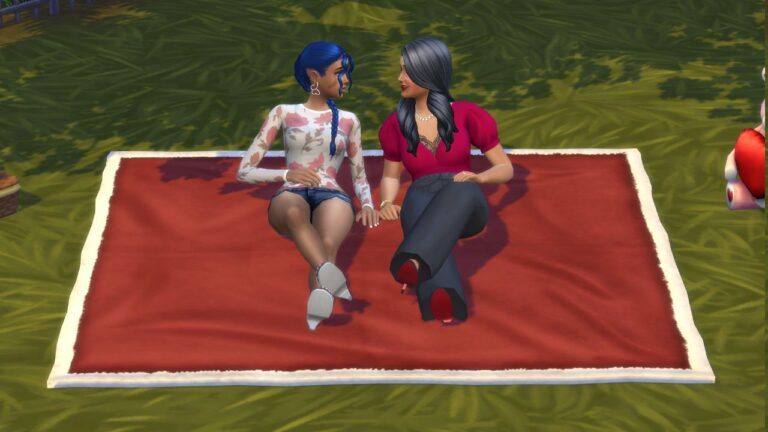 A screenshot from The Sims 4 of two sims sitting on a romantic blanket