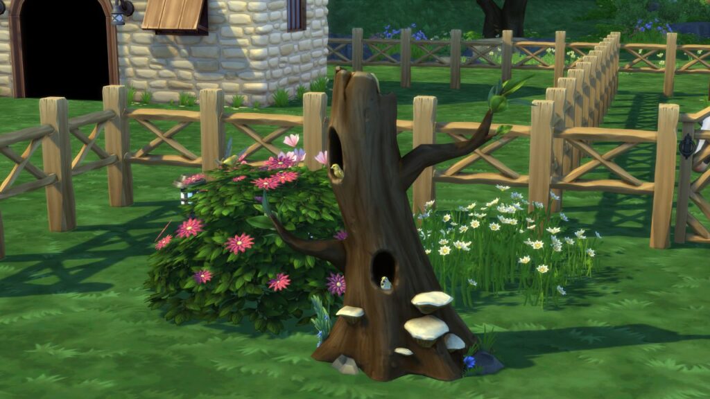 A screenshot from The Sims 4 showing a tree with birds inside of it on a sim's lot