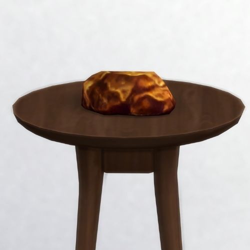 A screenshot from The Sims 4 showing a brown wooden table with crytunium on top