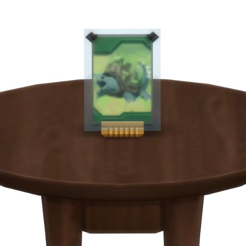 A screenshot from The Sims 4 showing a brown table with a Voidcritter on top. This has the voidcritter named mytheme