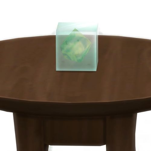A screenshot from The Sims 4 showing a dark brown table with a Plumbobus element in a square on top
