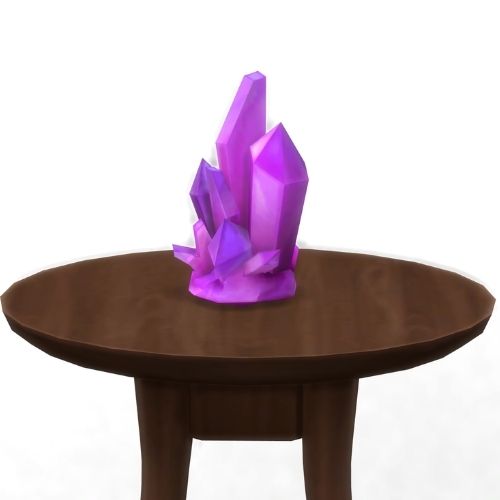 A screenshot from The Sims 4 showing a brown circular table with a crystal on top. This image has a crystal called amethyst