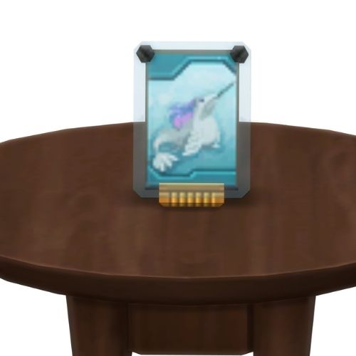 A screenshot from The Sims 4 showing a brown table with a Voidcritter on top. This has the voidcritter named arcticorn