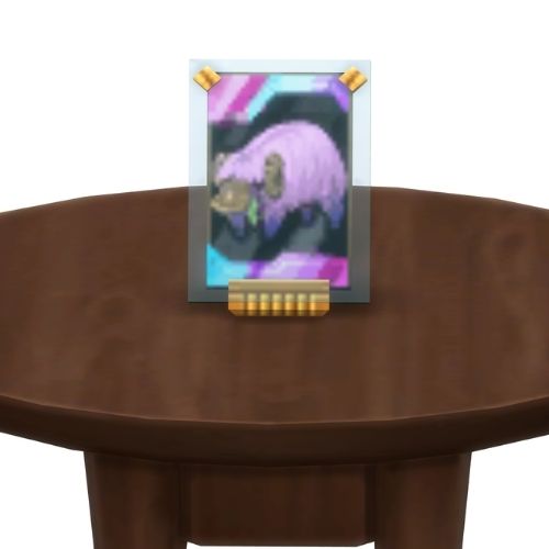 A screenshot from The Sims 4 showing a brown table with a Voidcritter on top. This has the voidcritter named bubalus