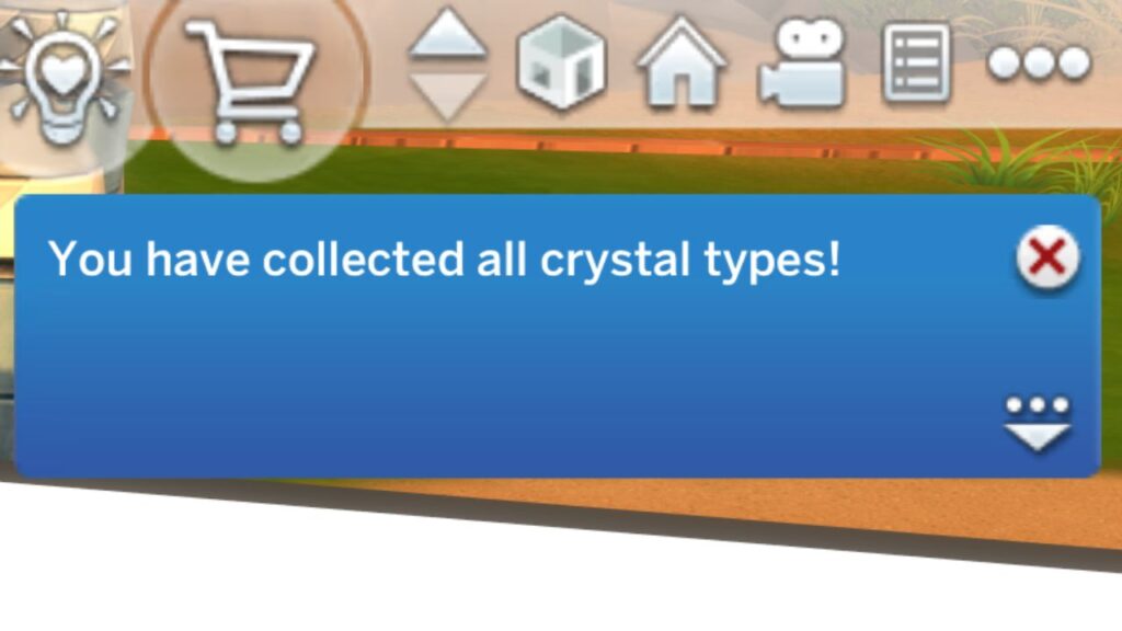 A screenshot from The Sims 4 showing the notification you get when you finish the crystal collection