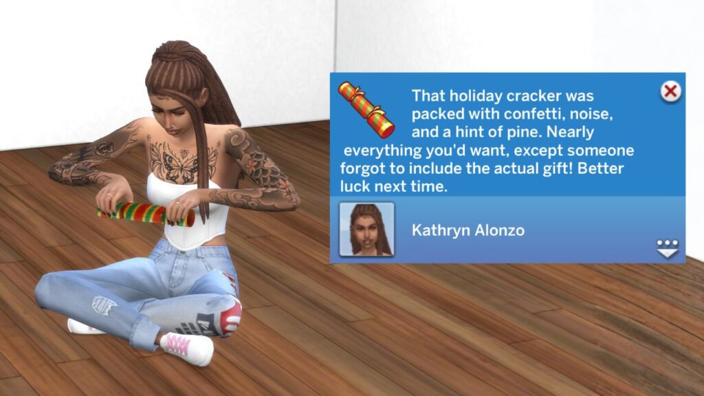 A screenshot from The Sims 4 showing a sim opening a holiday cracker and finding nothing