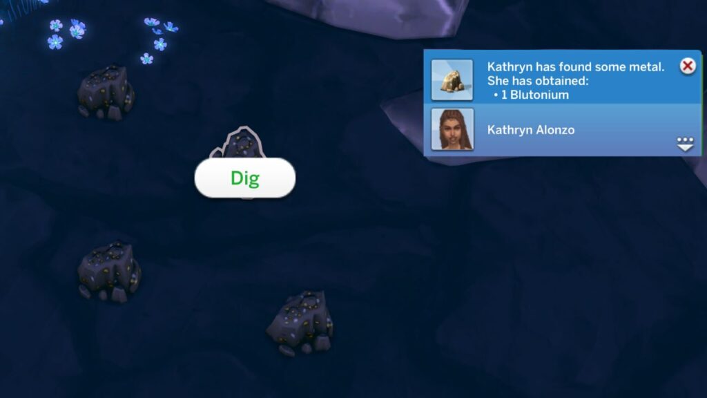A screenshot from The Sims 4 showing a group of four rocks and a notification showing that a sim found Blutonium.