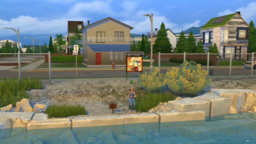 A screenshot from The Sims 4 showing a fishing spot in front of rockridge springs in evergreen harbor