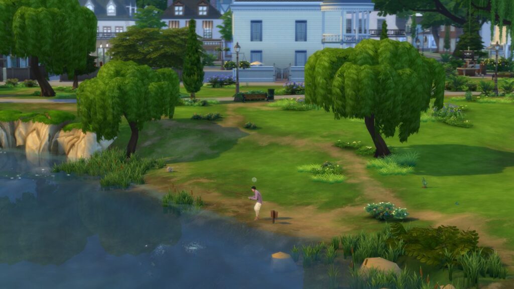 A screenshot from The Sims 4 showing a fishing spot behind the library in willow creek