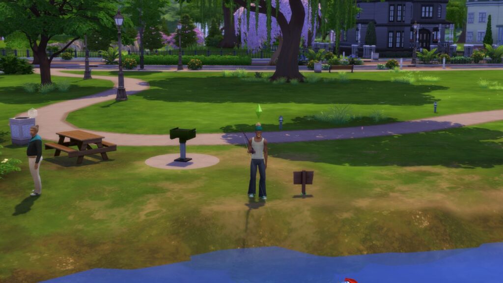 A screenshot from The Sims 4 showing a fishing spot near a grill and picnic table