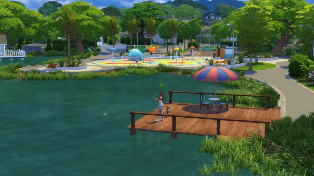 A screenshot from The Sims 4 showing a fishing spot located near a splash pad