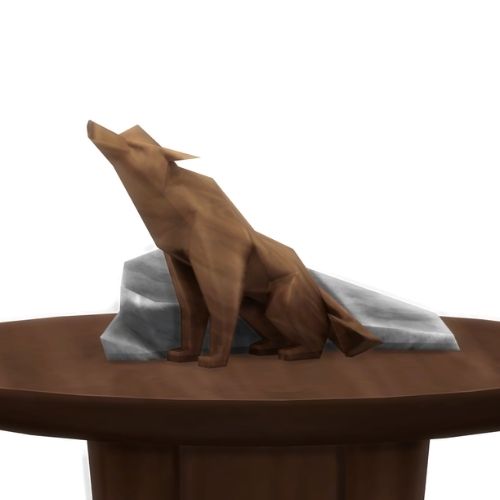A screenshot from The Sims 4 showing a brown wood table and on top is a dog statue next to a rock