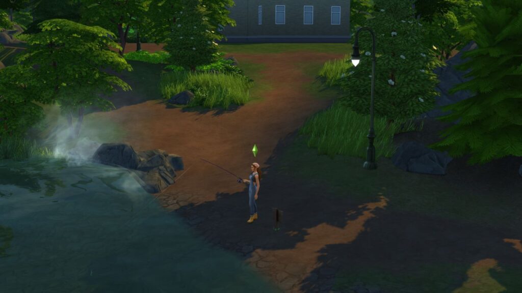 A screenshot from The Sims 4 showing a fishing spot in Glimmerbrook located down a path from a house