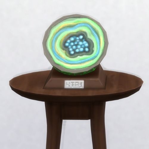 A screenshot from The Sims 4 with a brown table and on top is the geode named Glumbut