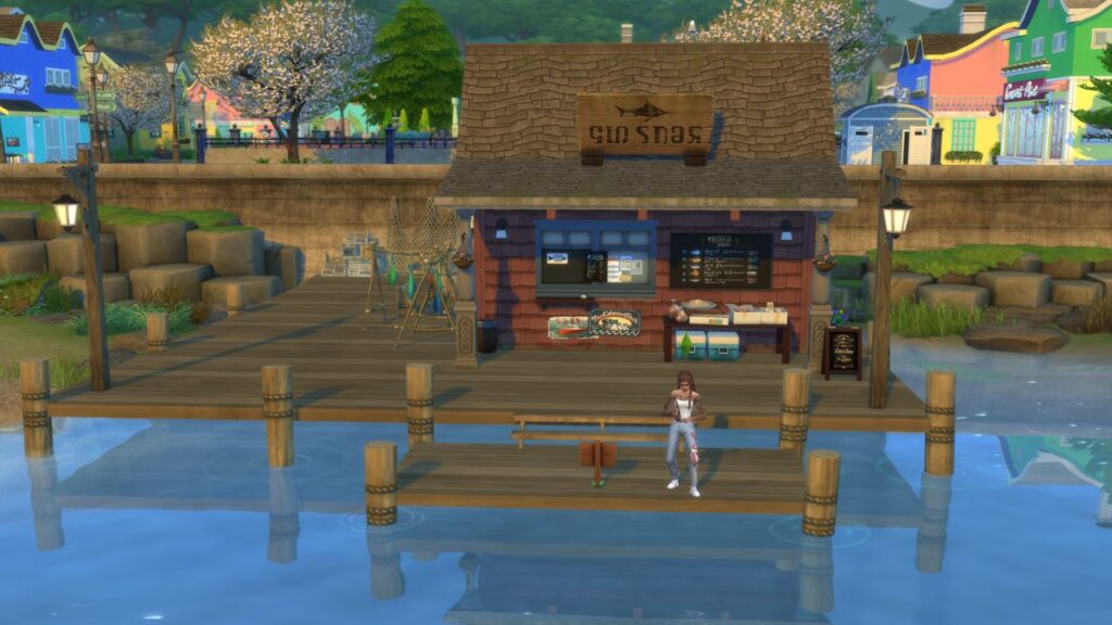A screenshot from The Sims 4 showing a sim fishing in front of a fish shop