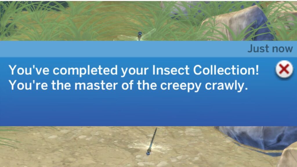 A screenshot from The Sims 4 showing the notification from completing the insect collection