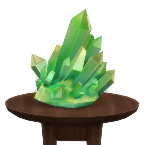 A screenshot from The Sims 4 showing a brown circular table with a crystal on top. This image has a crystal called jade