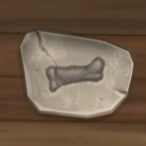 A screenshot from The Sims 4 showing a rock on the ground. On the rock is an image of a bone