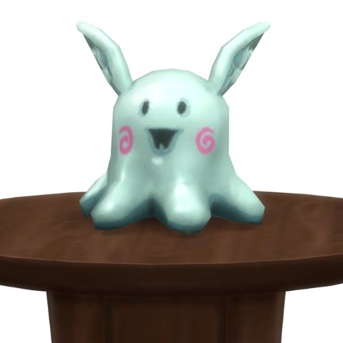 A screenshot from The Sims 4 showing a round, brown table with a Meduso Plushie on top