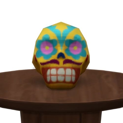 A screenshot from The Sims 4 showing a brown circle table with a yellow and blue skull on top