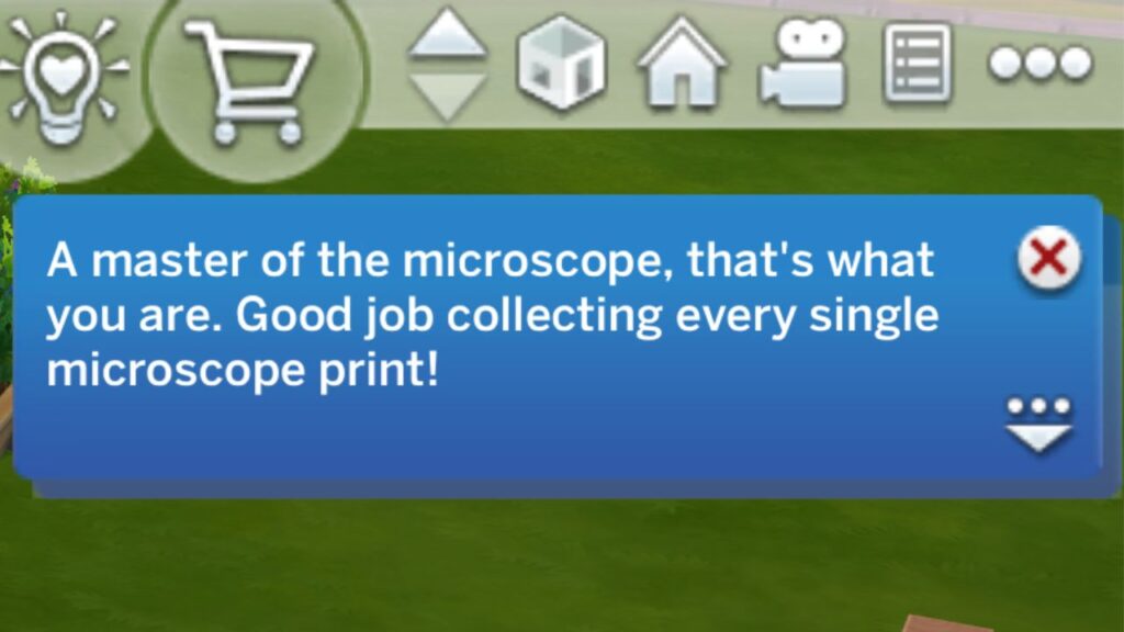 A screenshot from The Sims 4 showing the notification you get from finishing the microscope print collection 