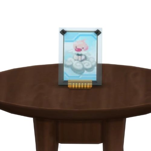 A screenshot from The Sims 4 showing a brown table with a Voidcritter on top. This has the voidcritter named nimbus