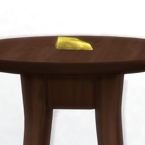 A screenshot from The Sims 4 showing a brown wooden table with Phozonite on top