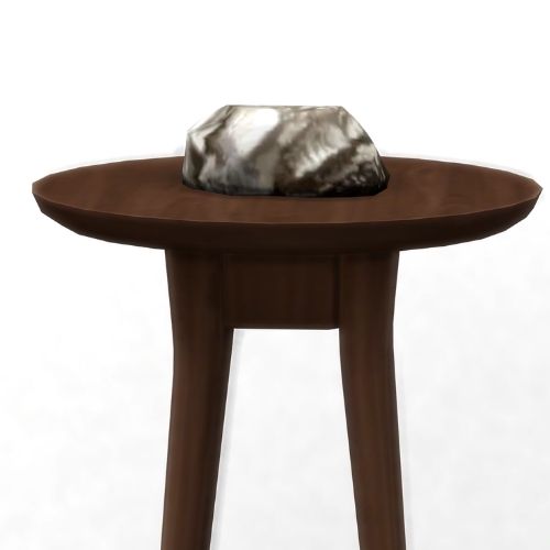 A screenshot from The Sims 4 showing a brown wooden table with Plathium on top