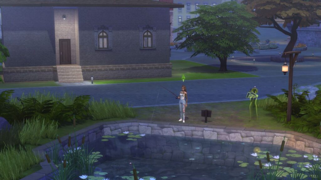 A screenshot from The Sims 4 showing a fishing spot in Ravenwood behind Moppy Manor