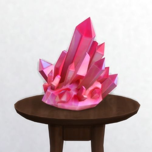 A screenshot from The Sims 4 showing a brown circular table with a crystal on top. This image has a crystal called rose