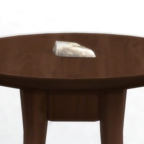 A screenshot from The Sims 4 showing a brown wooden table with silver on top