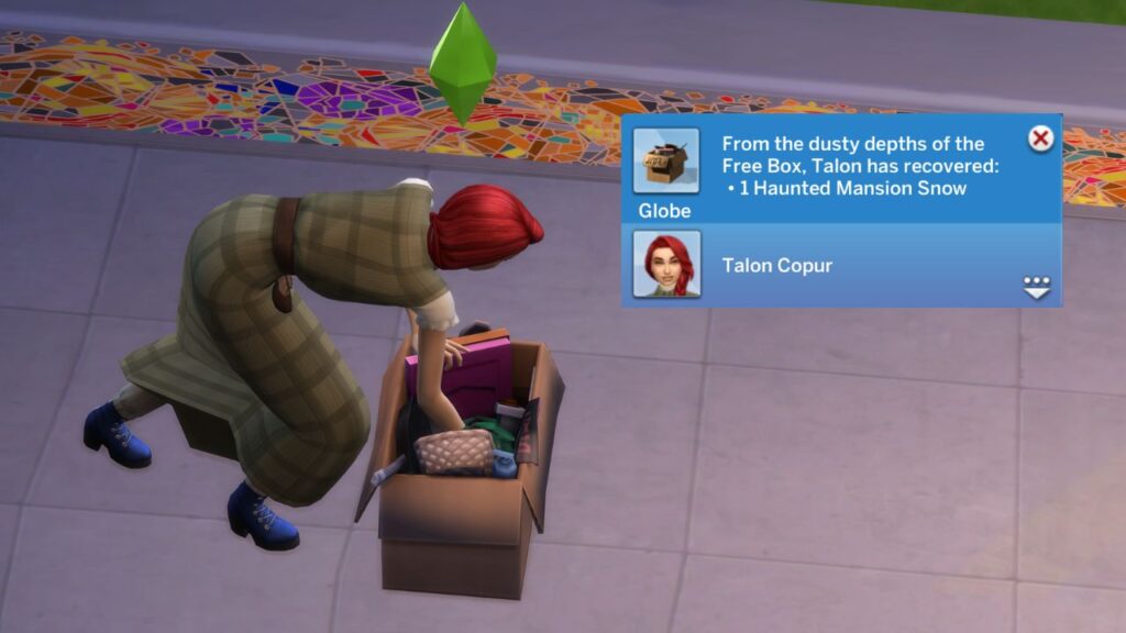 A screenshot from The Sims 4 showing a sim digging through a box for a snow globe and the notification you get when you find them
