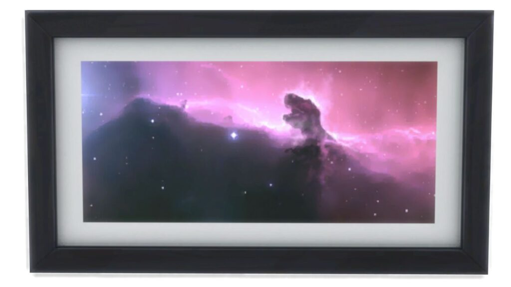 A screenshot from The Sims 4 showing a black frame with a print of a night sky in pink with a t-rex head in the clouds and stars