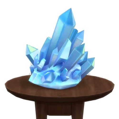 A screenshot from The Sims 4 showing a brown circular table with a crystal on top. This image has a crystal called turquoise