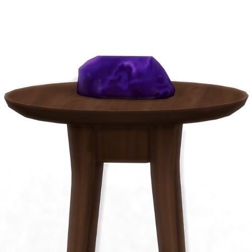 A screenshot from The Sims 4 showing a brown wooden table with utranium on top