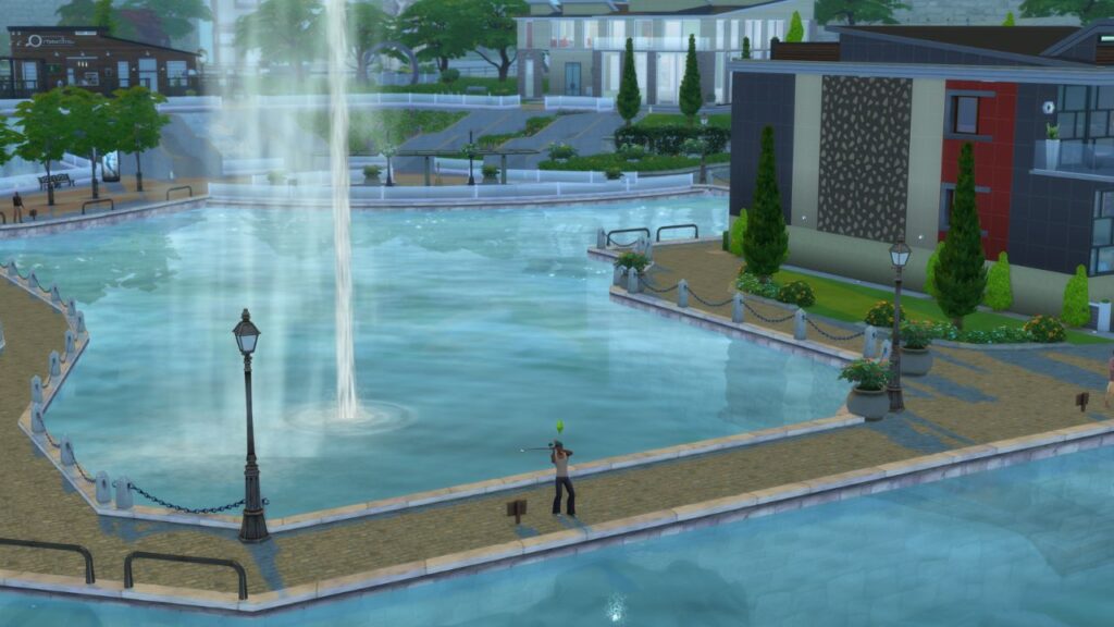 A screenshot from The Sims 4 showing a fishing spot in Windenburg near a fountain by the nightclub