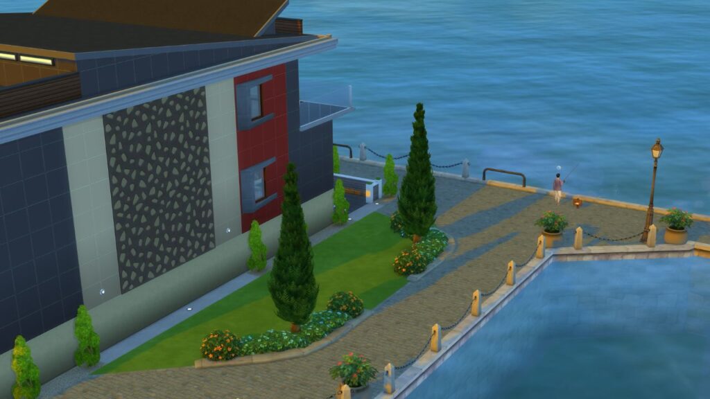 A screenshot from The Sims 4 showing a fishing spot in Windenburg to the right of the nightclub