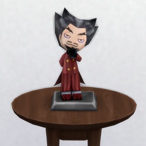 A screenshot from The Sims 4 with a small, circular brown table. On top is a MySims Trophy named Morcubus