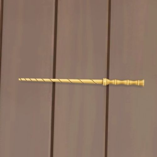 A screenshot from The Sims 4 showing a wooden floor with a gold bone wand with twists on top