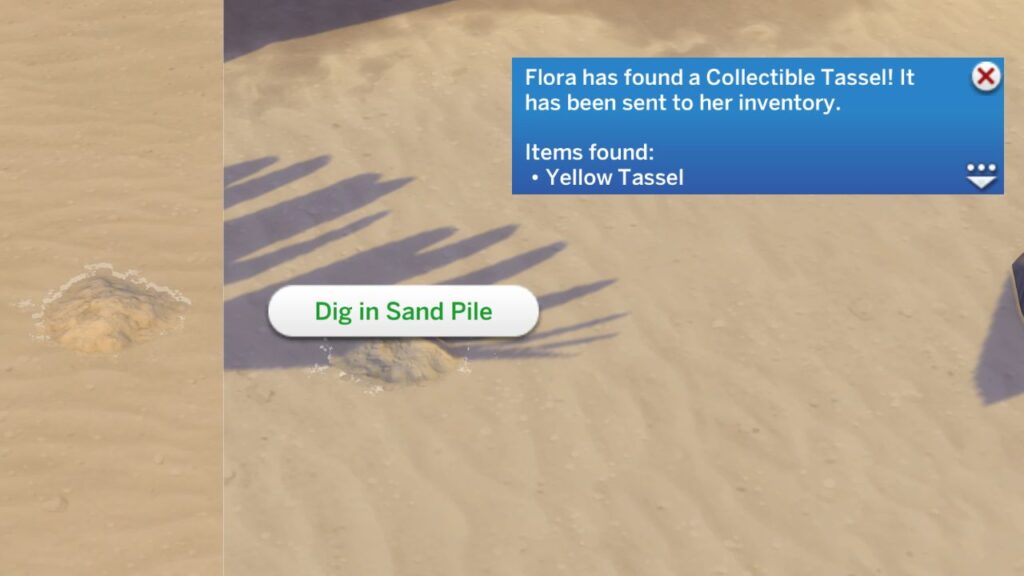A screenshot from The Sims 4 showing how to dig up tassels from sand 