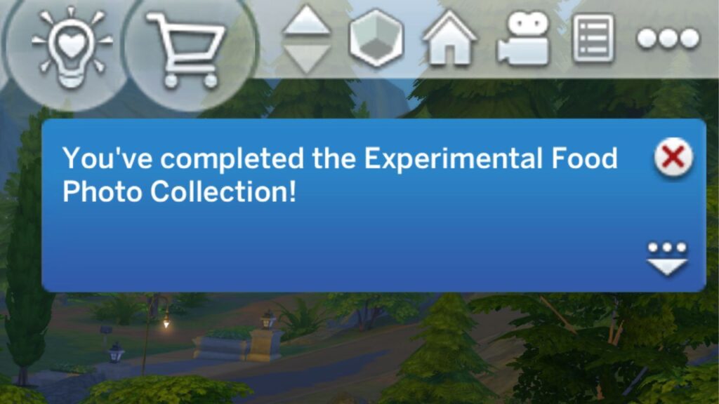 A screenshot from The Sims 4 showing the notification you get from finishing the experimental food photo collection