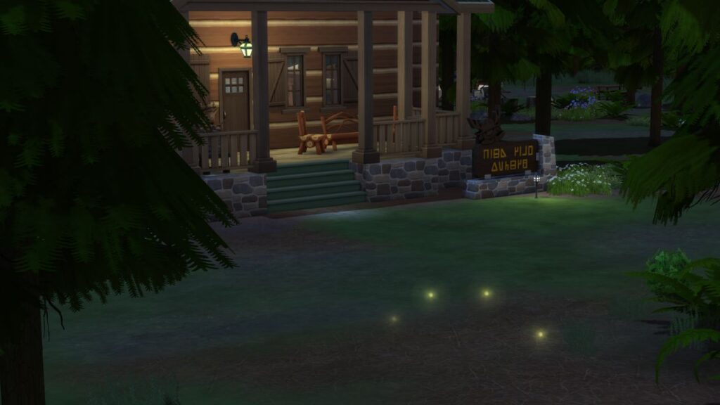 A screenshot from The Sims 4 showing some fireflies in front of a building