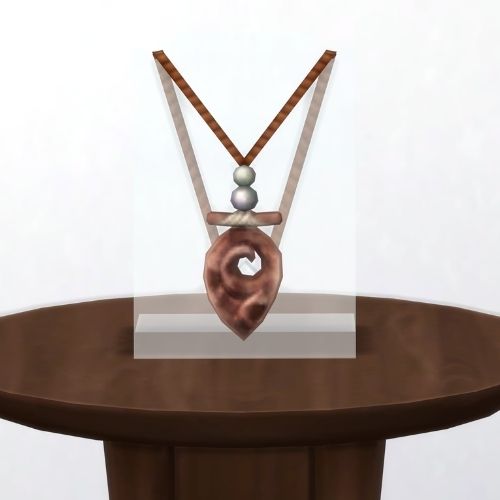 A screenshot from The Sims 4 showing a brown table with The Heart of Sulani in light speckled brown