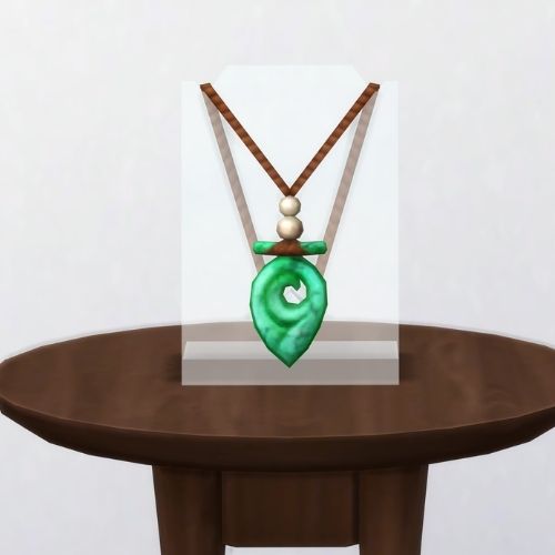 A screenshot from The Sims 4 showing a brown table with The Heart of Sulani in green