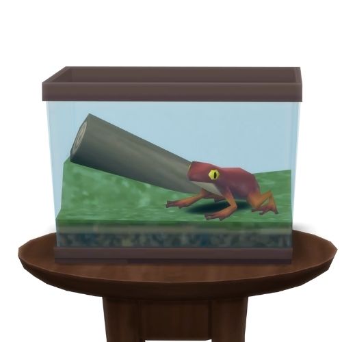 A screenshot from The Sims 4 showing a circle table with a terrarium on top and a heart frog inside